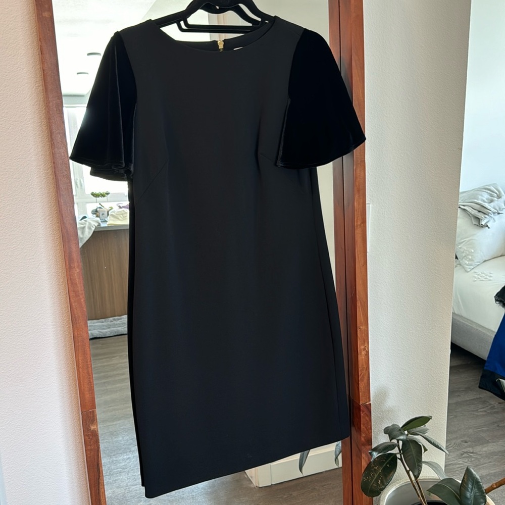 Black Calvin Klein dress with velvet sleeves. Size 4